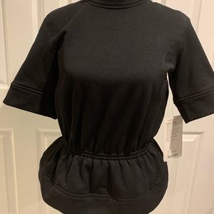 Lululemon Peplum Top new, size 4 black